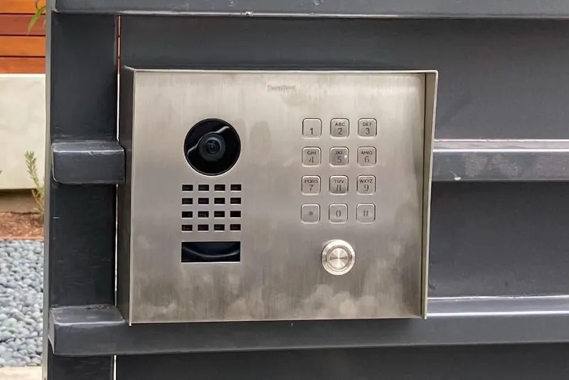 A telephone entry system opened for programming during a service visit