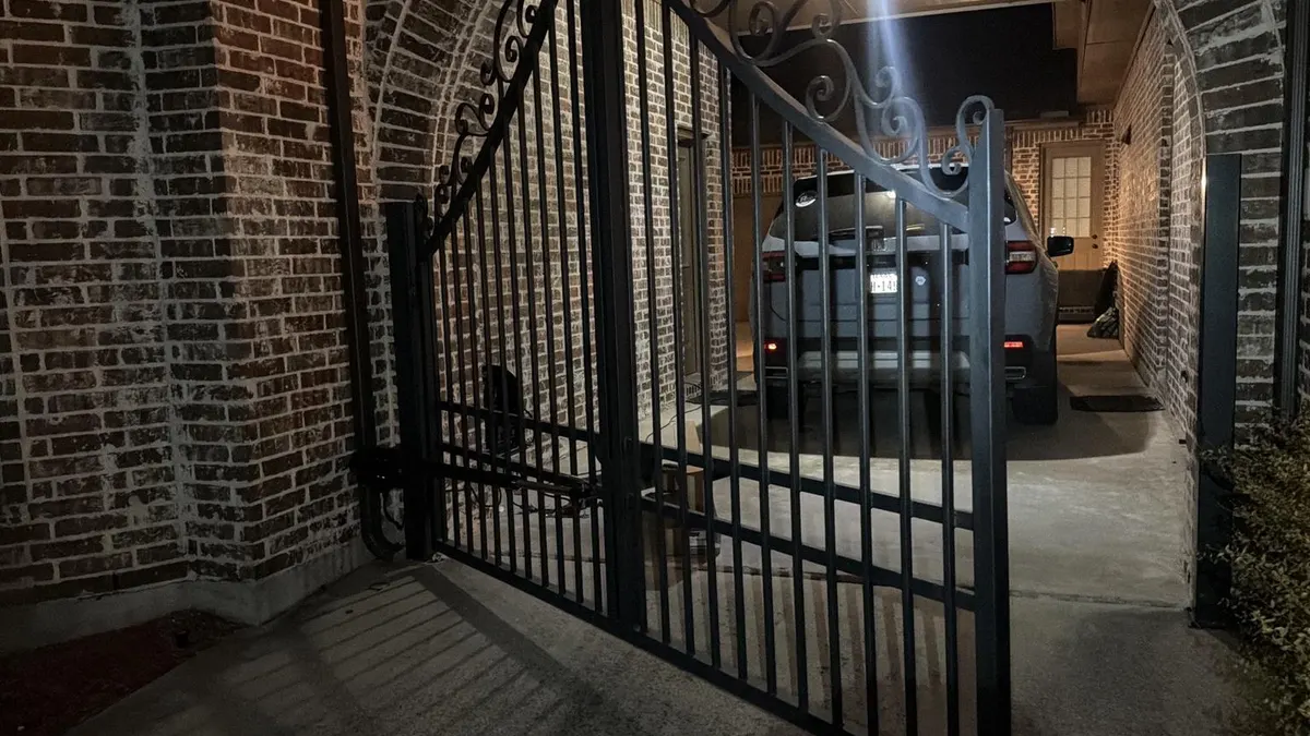 Additional view of the swing gate in an open position.