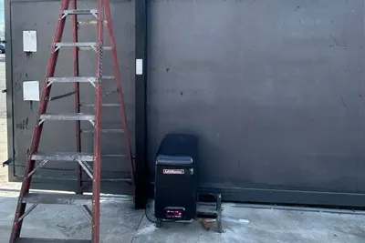 A commercial gate control cabinet opened for diagnosis