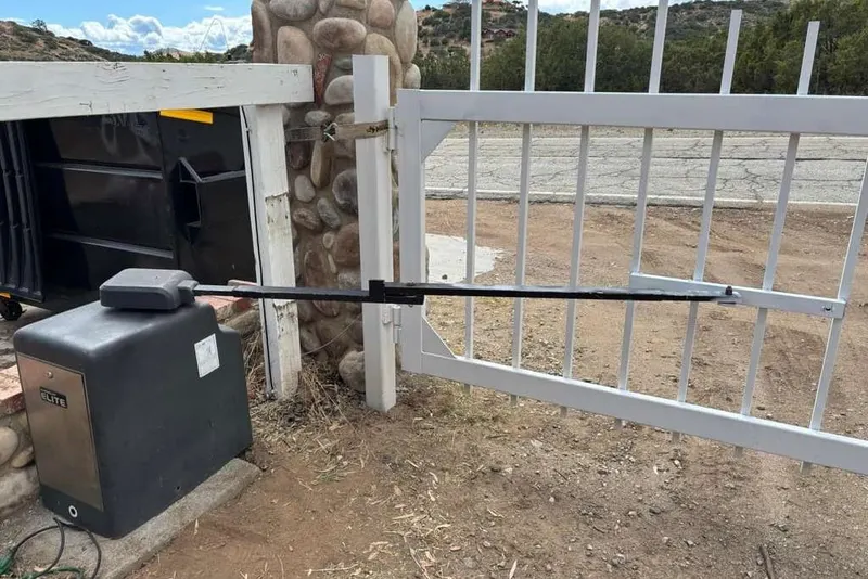 The interior of an Elite gate operator showing the control board and transformer
