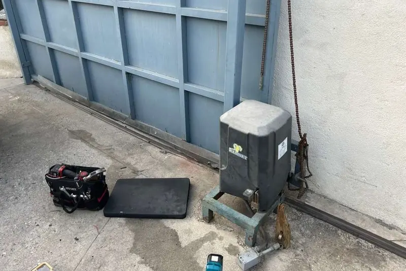 The control board of a commercial gate operator with the enclosure door open